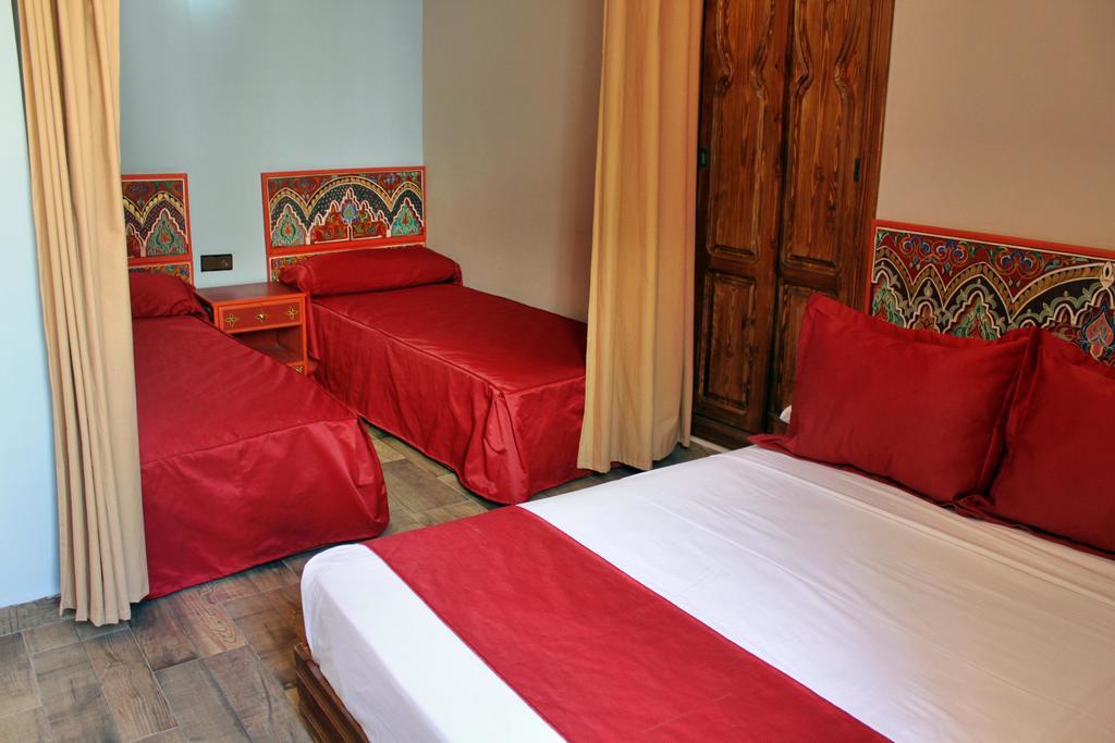 Hotel Maram Tanger Bilik gambar